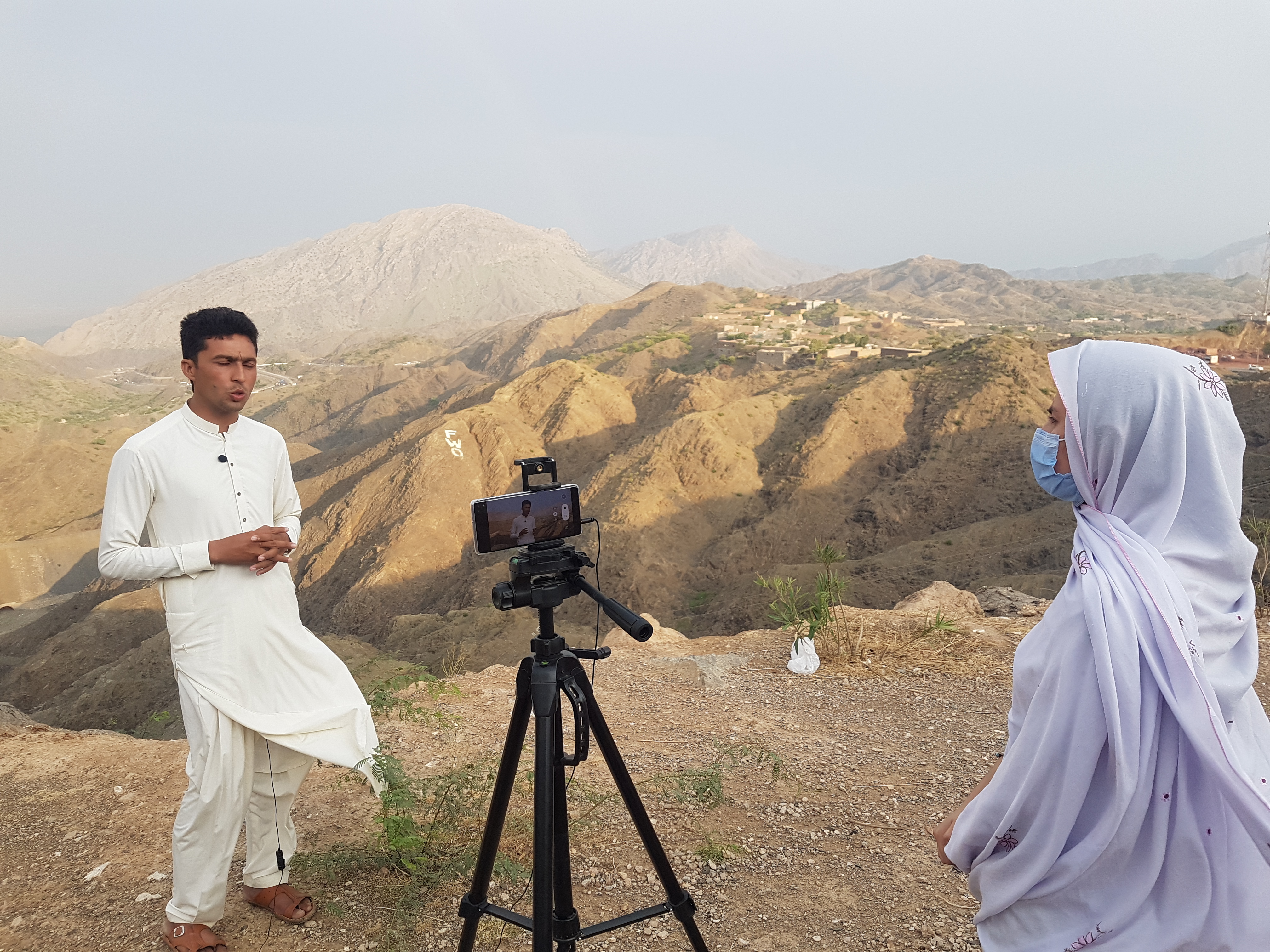 Journalist at work in rural Pakistan