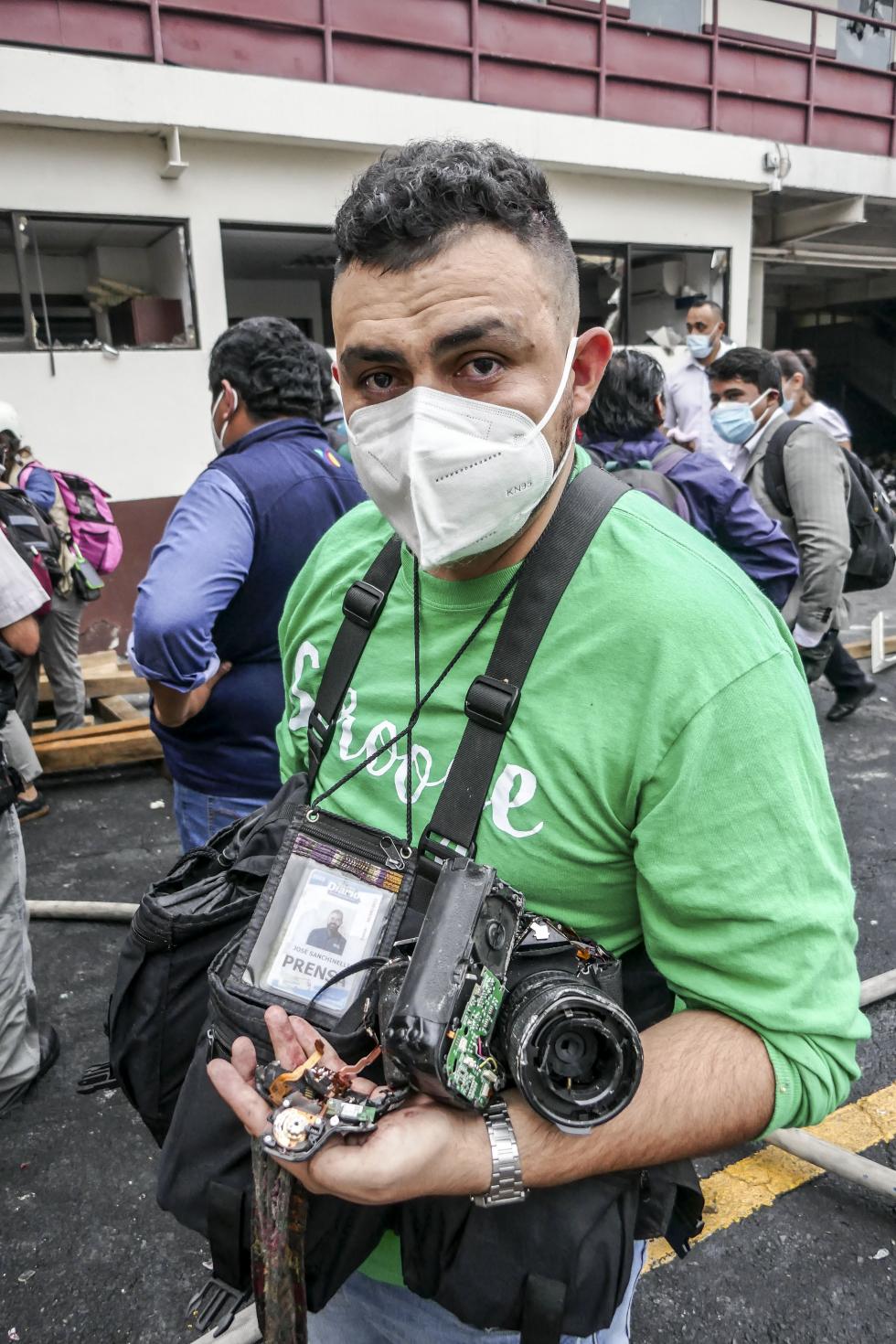 José Sanchinelli reporter from a local newspaper was attacked during the riots of Hundreds of former civilian patrol elements burned part of the Congress building during demanding a financial compensation. On October 19, 2021 in Guatemala City, Guatemala. 