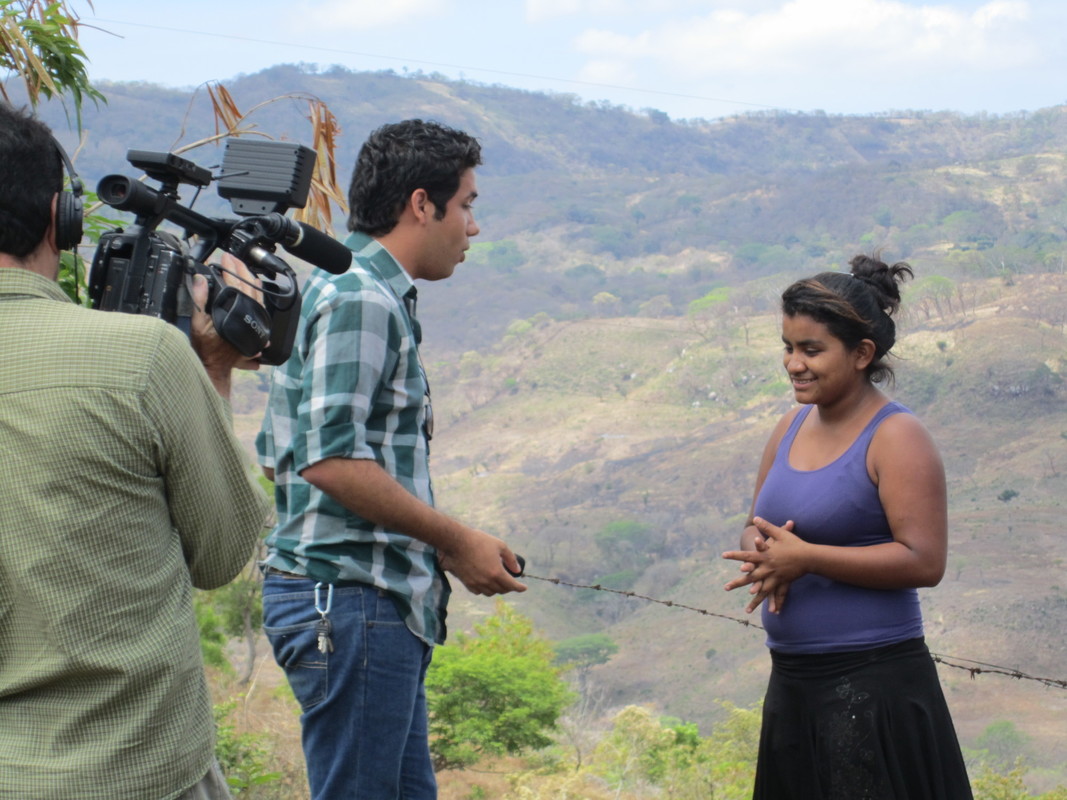 Young woman being interviewed by journalist in Nicaragua