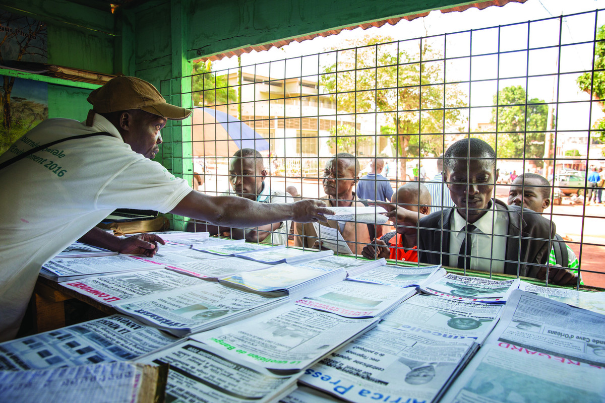 Selling newspapers in Central African Republic