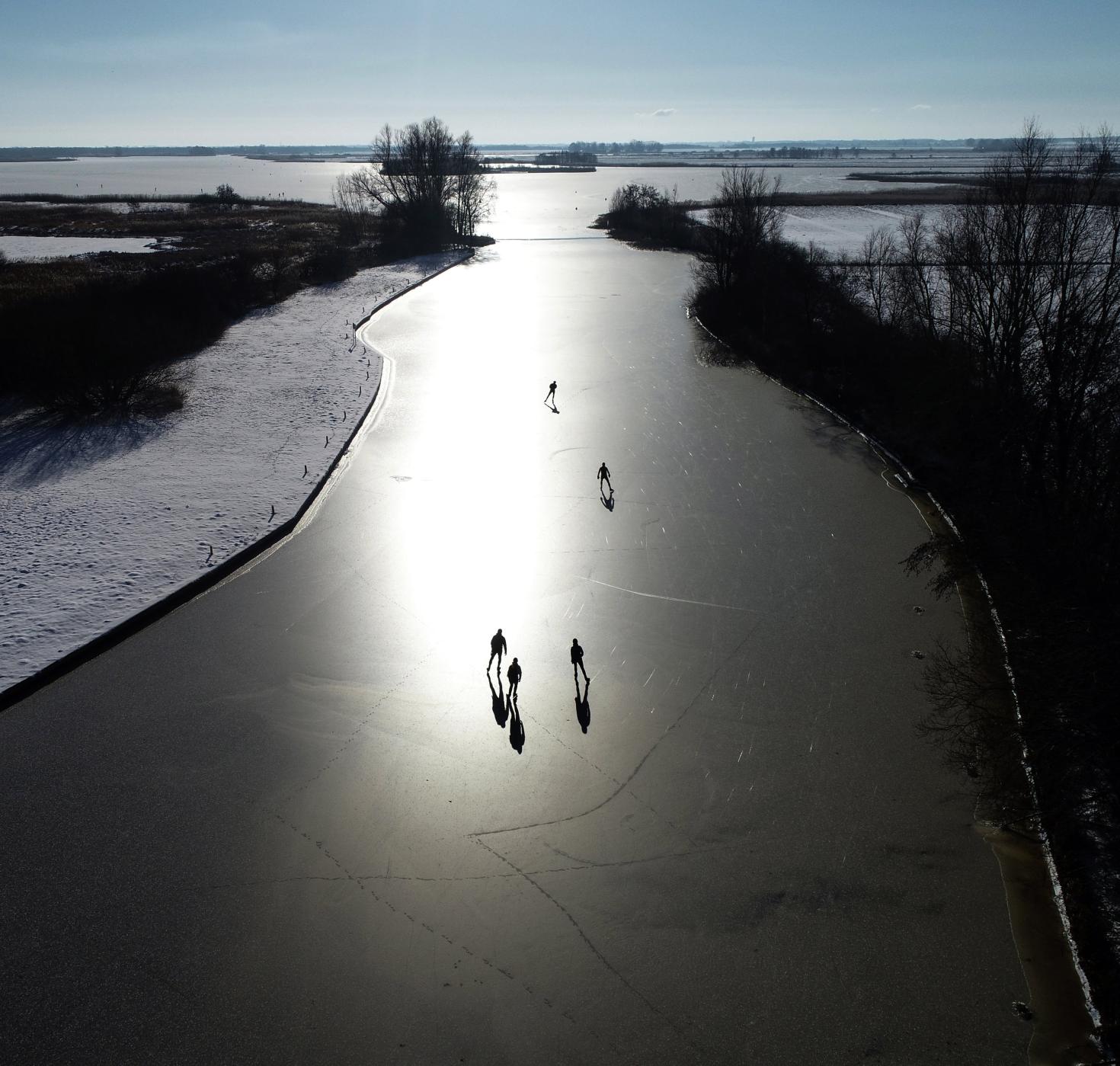 Photo "Ice skaters in Dutch winter" by Eric Brinkhorst