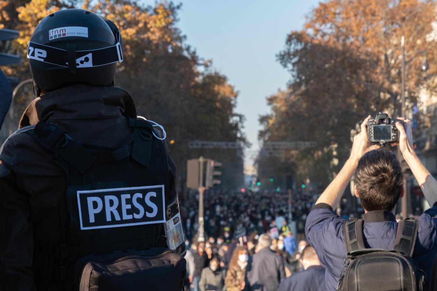 Journalists covering protest: by Tact hill