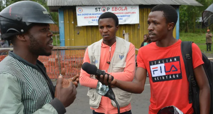Journalists doing an interview during the Ebola outbreak in the DRC