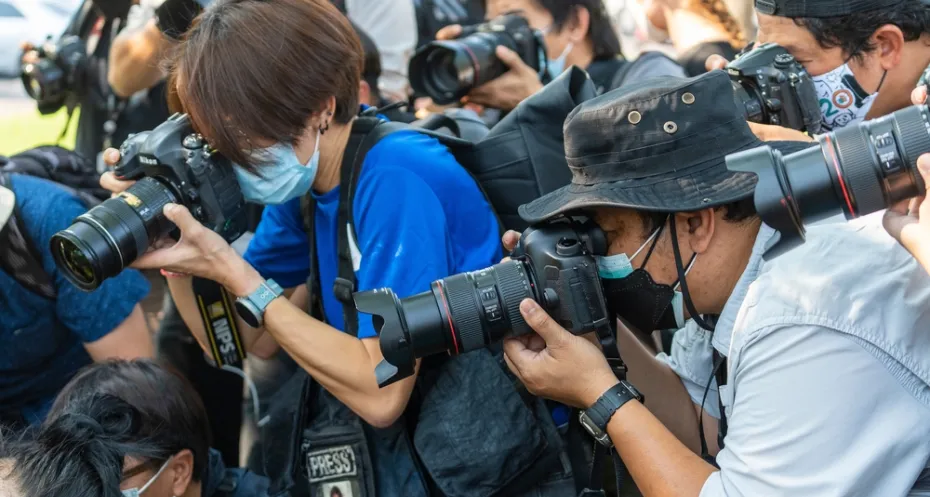 Journalists in Thailand taking pictures