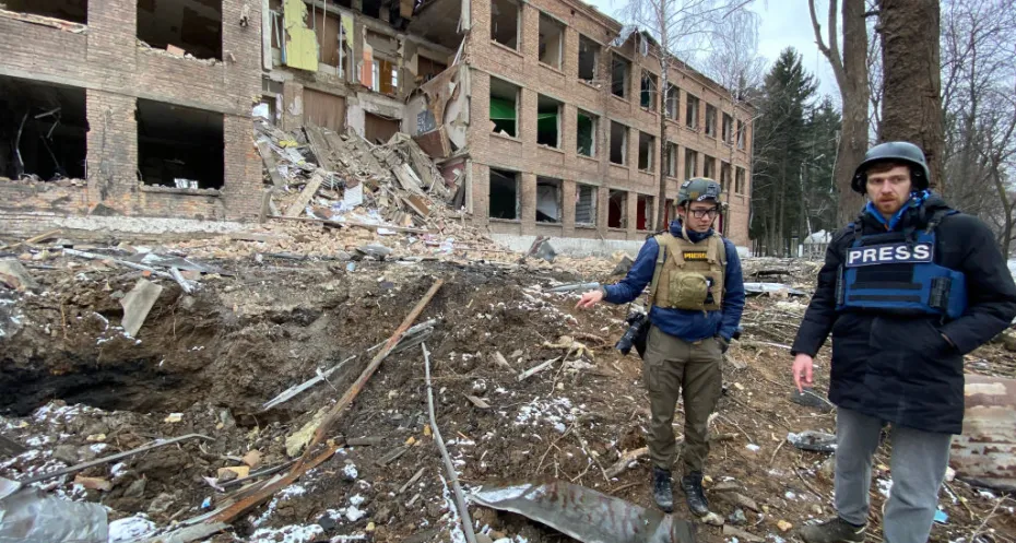 Journalists visit the site of the rocket attack launched by Russian invaders in northern Ukraine