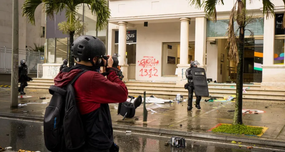 Journalist at work during a demonstration in Colombia